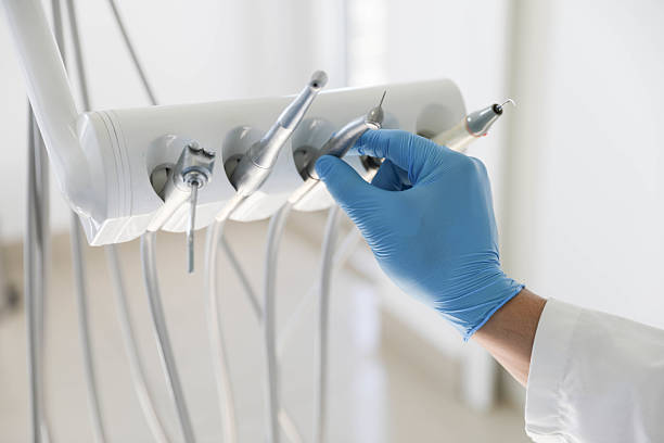 Professional Tooth Extraction technician working in Bellevue, WA
